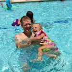 Baby V smiling and learning to swim