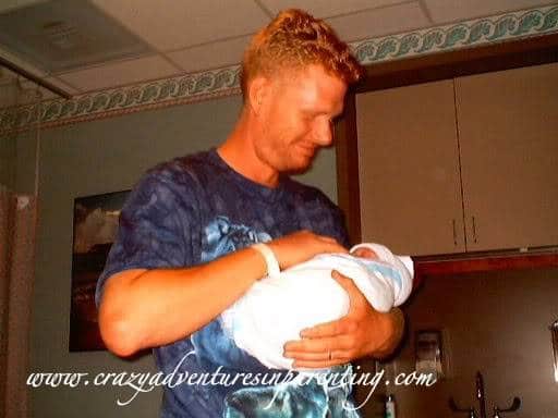 daddy holding son