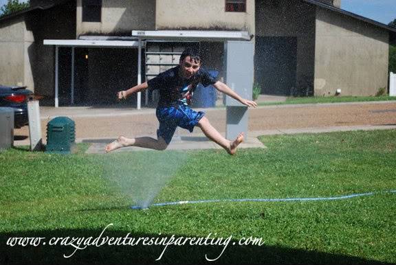 leaping in sprinkler