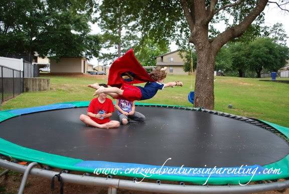 flying super hero five-year-old