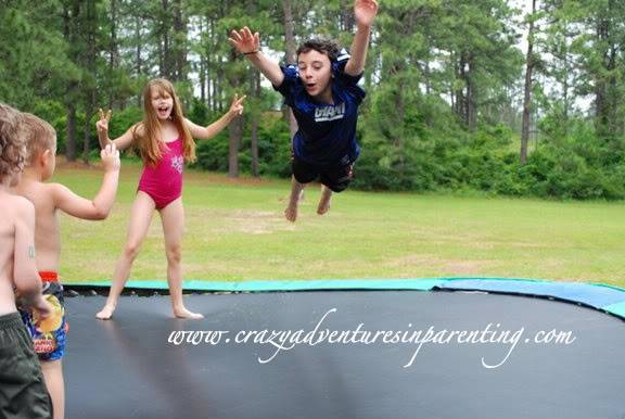 flying children on trampoline