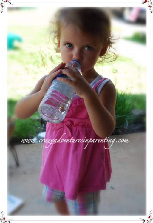 Toddler Drinking Bottled Water