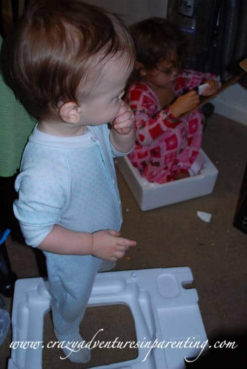 kids play with packing foam