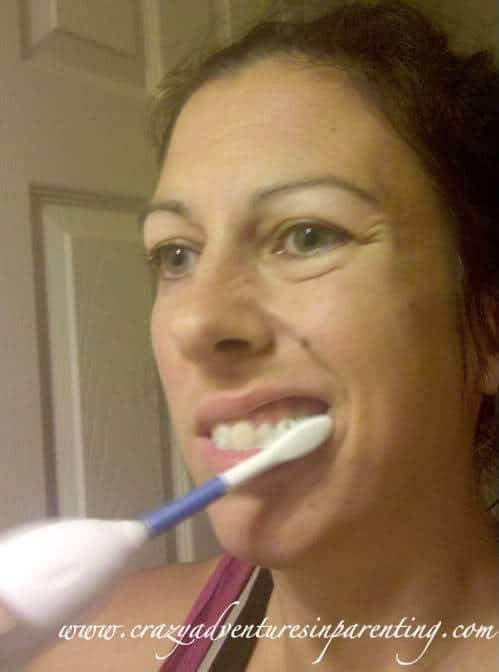 Lisa using the Sonicare toothbrush