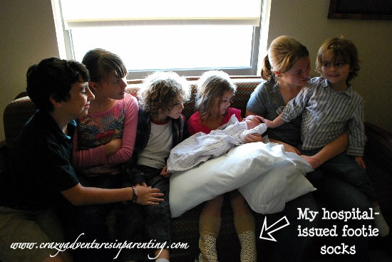 All seven kids captioned photo
