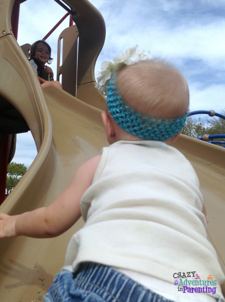 playing baby at the park
