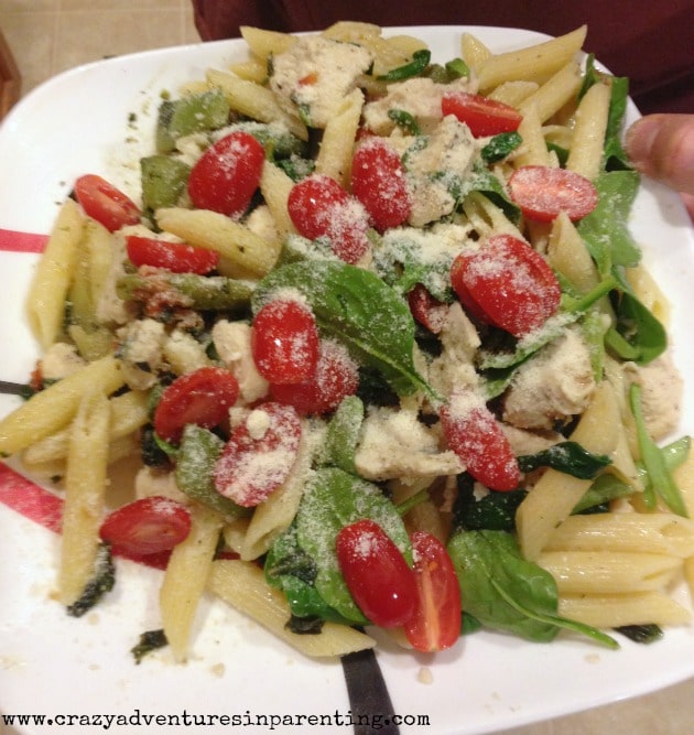 spinach tomato penne pasta dish