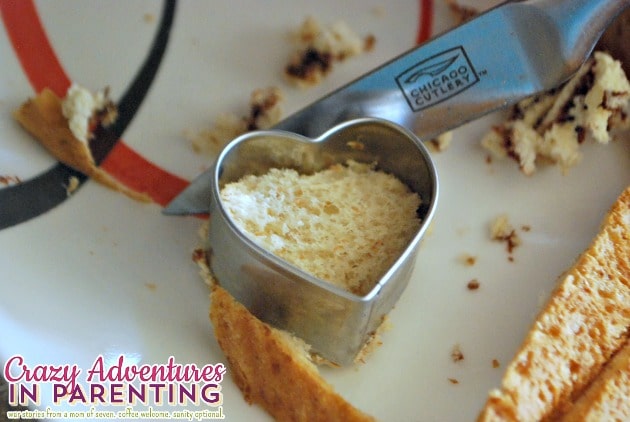 Making heart-shaped Nutella tea sandwiches