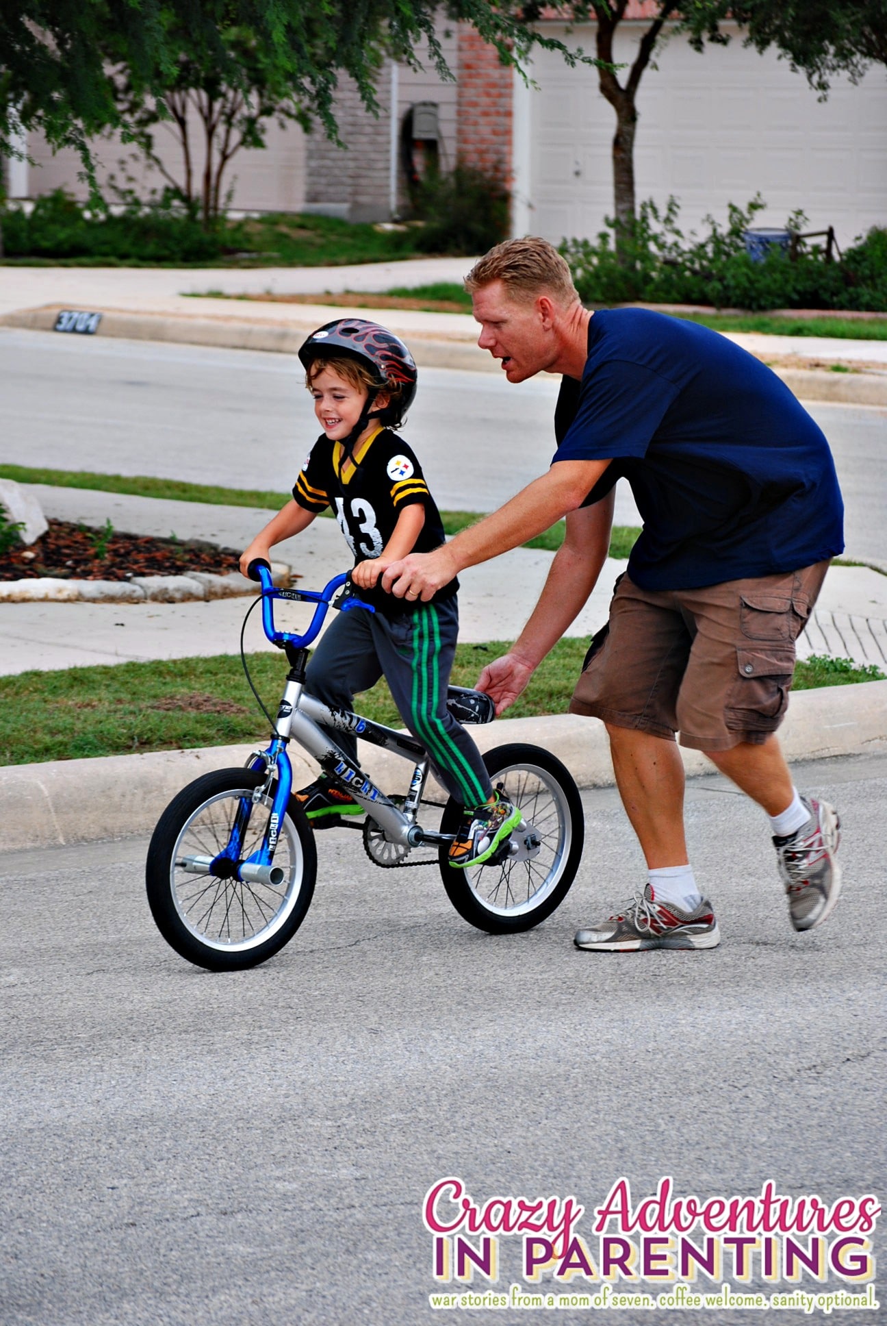 baby dude riding a two wheeler