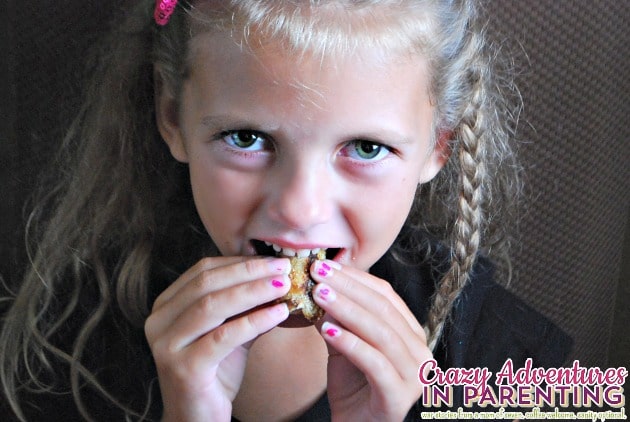 daughter enjoying the nutella roll ups
