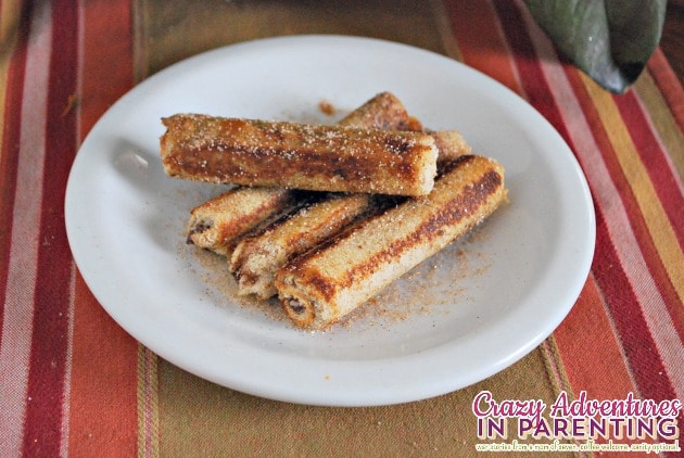 Nutella roll ups with peanut butter cream cheese and cinnamon sugar