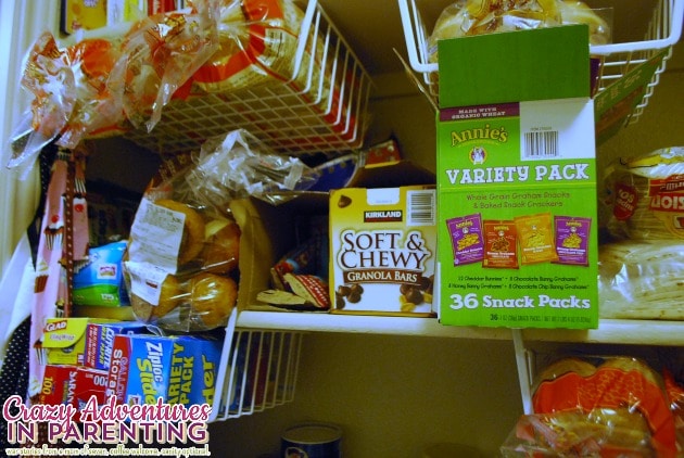 organized breads and snacks on fourth shelf in pantry