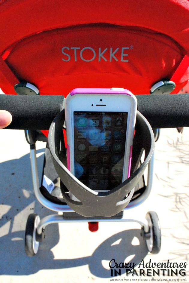 Stokke Scoot cupholder holding an iPhone