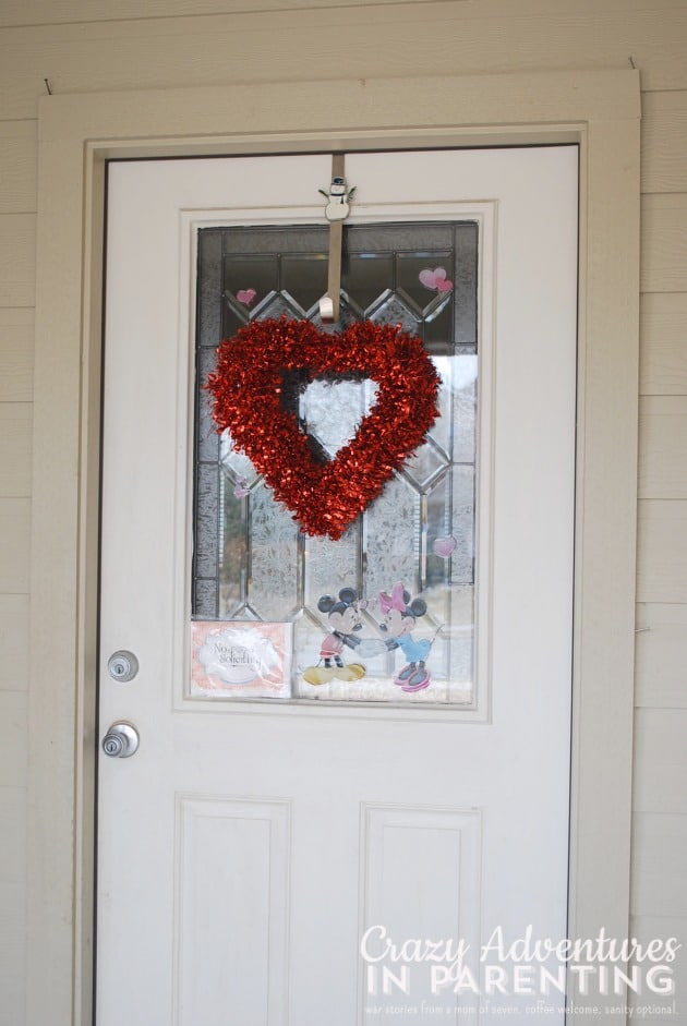 heart wreath on front door for Valentine's decorations