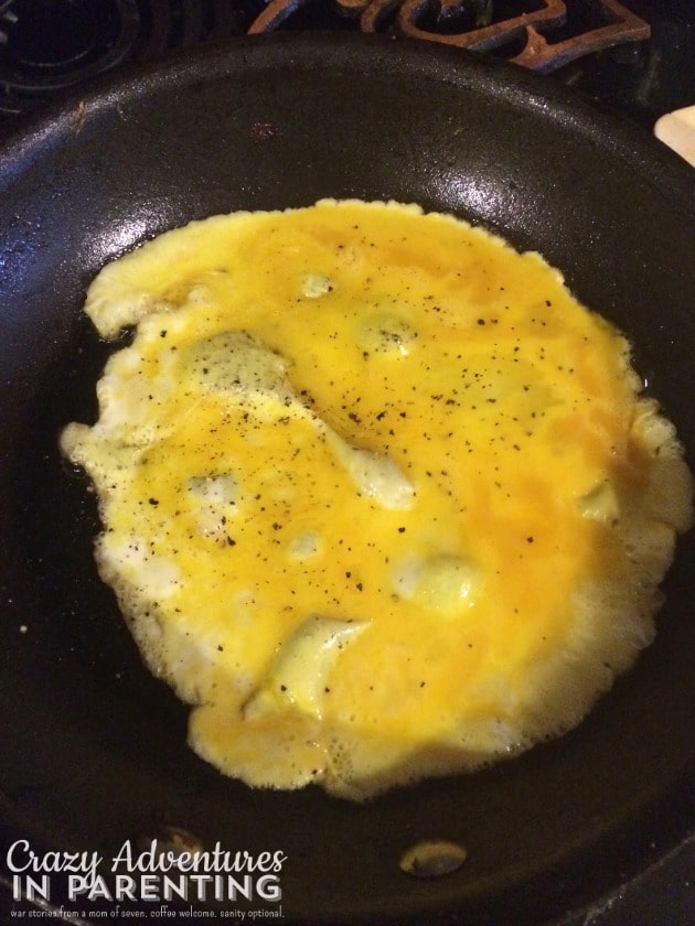 poured scrambled eggs in the pan