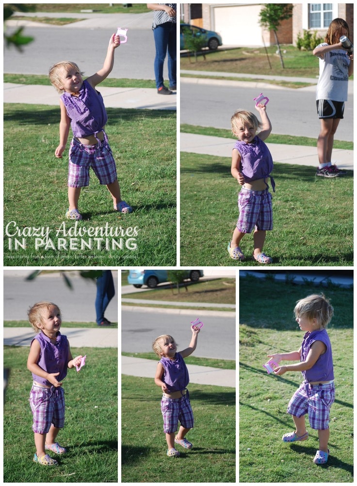 the many faces of Baby V while flying her kite