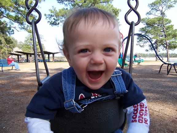 Happy on the swings