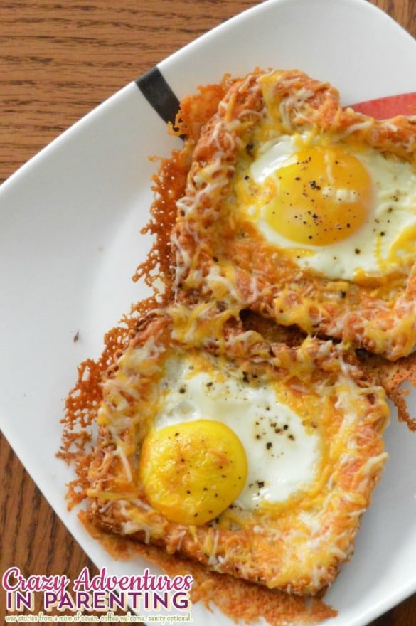 Cheesy Baked Egg Toast on a plate Cheesy Baked Egg Toast on a plate