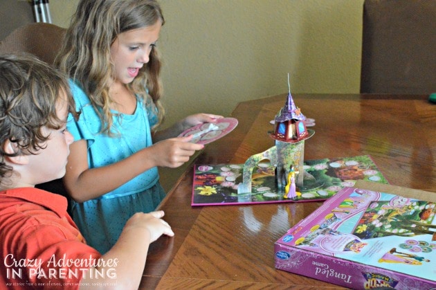 Kids playing the Disney Princess Tangled Pop-Up Magic Game