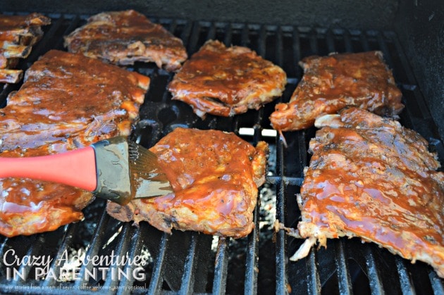 barbecue ribs basted on the grill