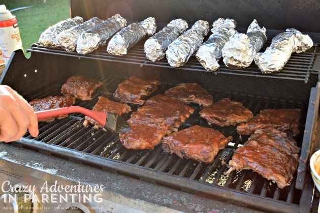 barbecue ribs on the grill with grilled corn