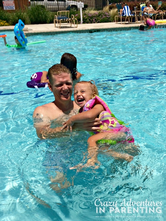 Baby V smiling and learning to swim