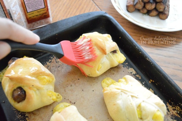 brush butter and season Sausage Egg and Cheese Crescents