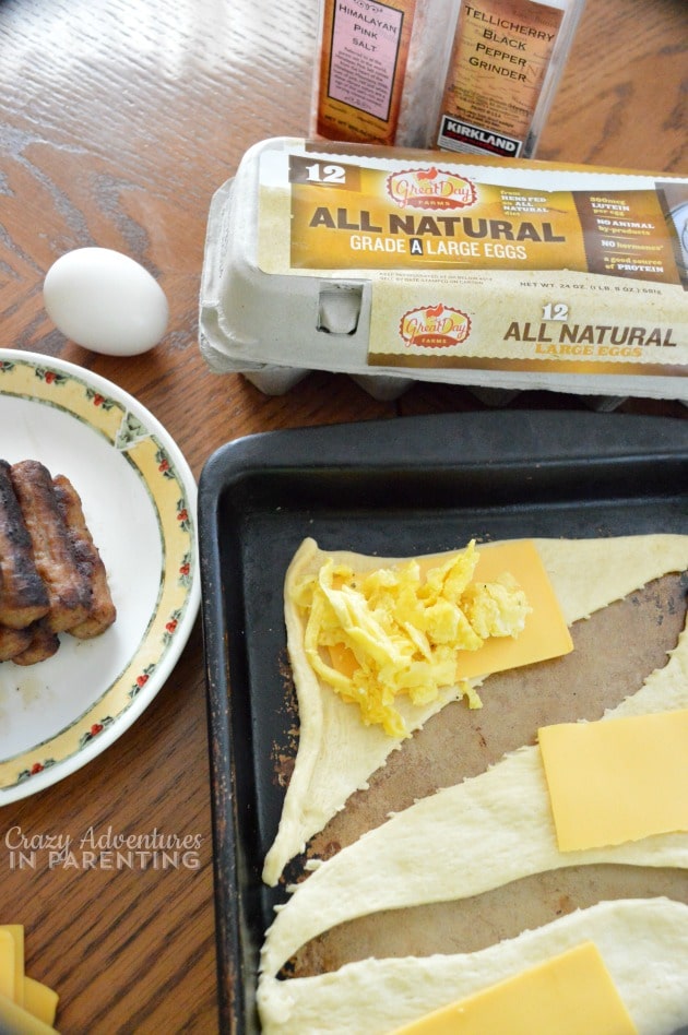 layer eggs and cheese on the Sausage Egg and Cheese Crescents