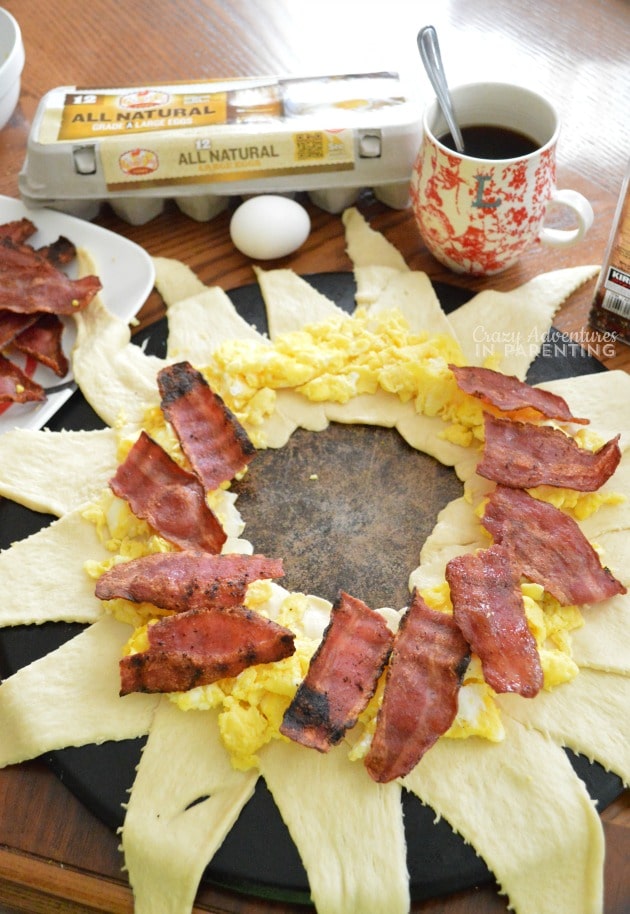 layering Bacon Egg and Cheese Breakfast Ring