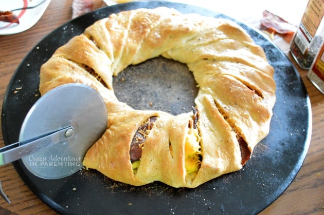 slicing the Bacon Egg and Cheese Breakfast Ring