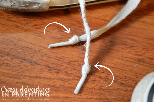 tie a knot at the end of the shoelace