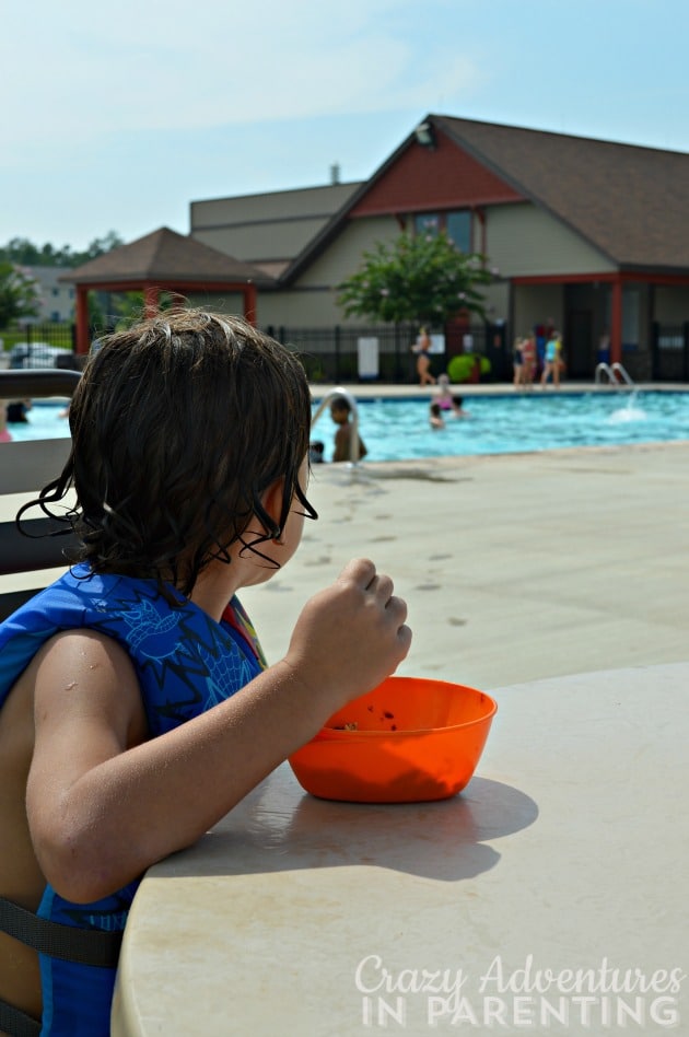 Baby Dude snack time at the pool