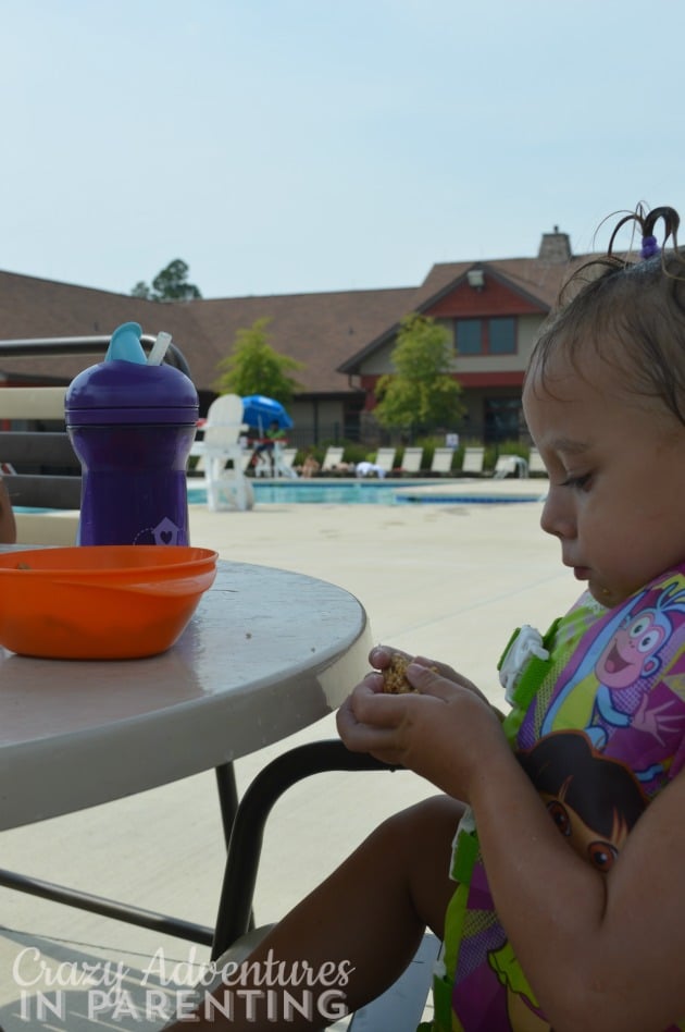 eating snack at the pool