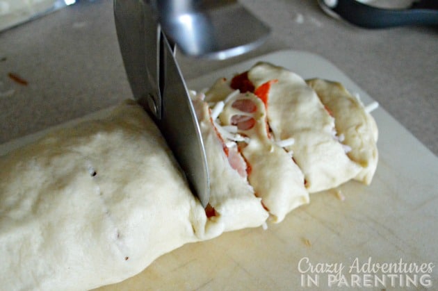 homemade pizza roll slicing