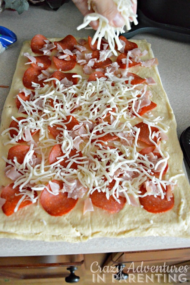 homemade pizza rolls add the cheese