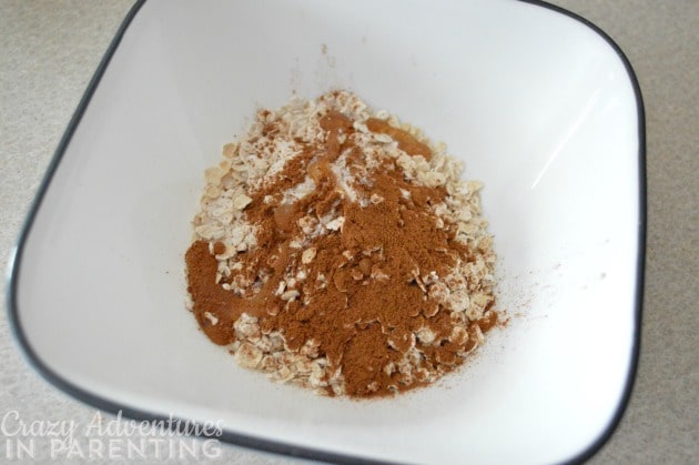 cinnamon and pure maple syrup added to plain oats for oatmeal