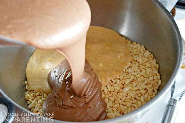 pouring crispy treats mixture into pan