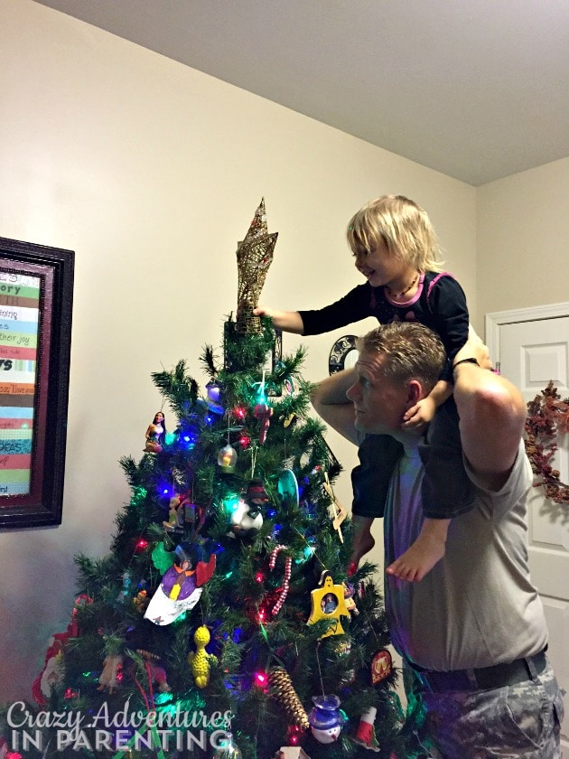 adding the tree topper