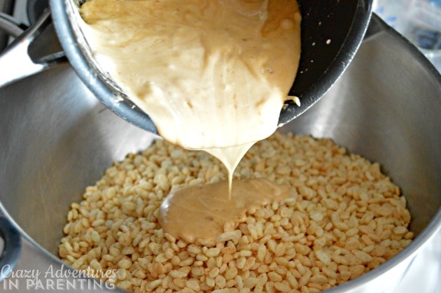 pouring melted marshmallow onto crispy cereal