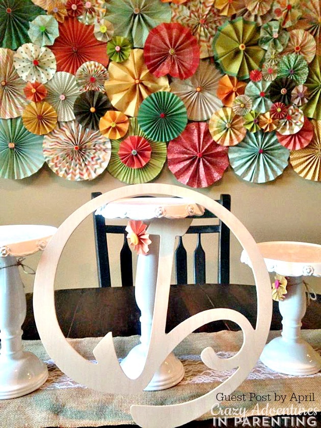 paper rosette wall decor in the background