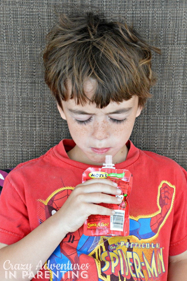 Baby Dude taking a quick snack break with Mott's on the porch