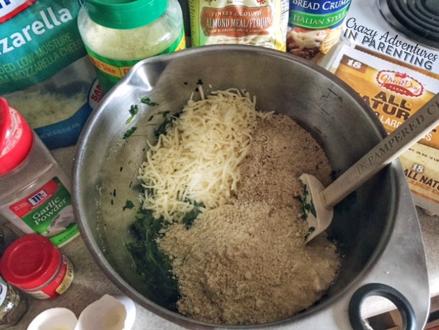 adding ingredients for spinach balls
