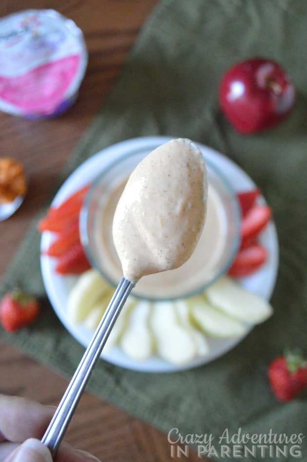 pumpkin yogurt dip on a spoon