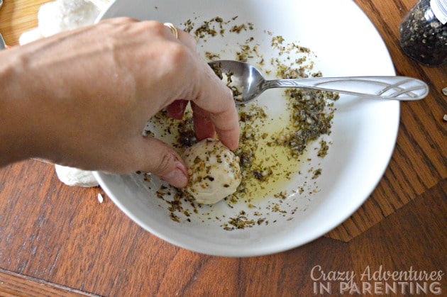 rolling bread in seasoned oil