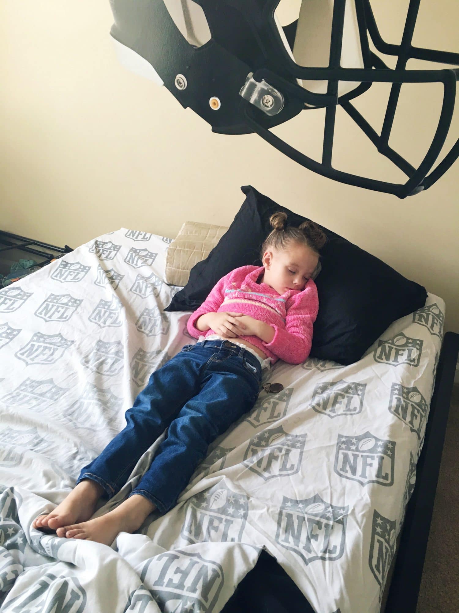 Sleeping toddler in brother's room