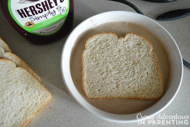 Dip bread into chocolate French toast mixture