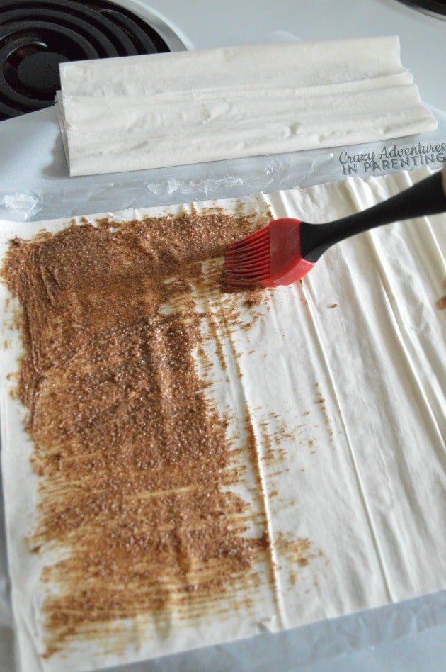 Spread cinnamon roll mixture onto phyllo dough