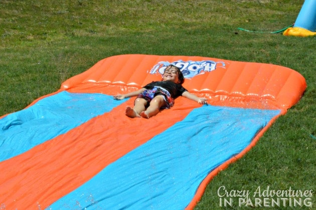 Relaxing in the sun on the H2OGO! triple slide