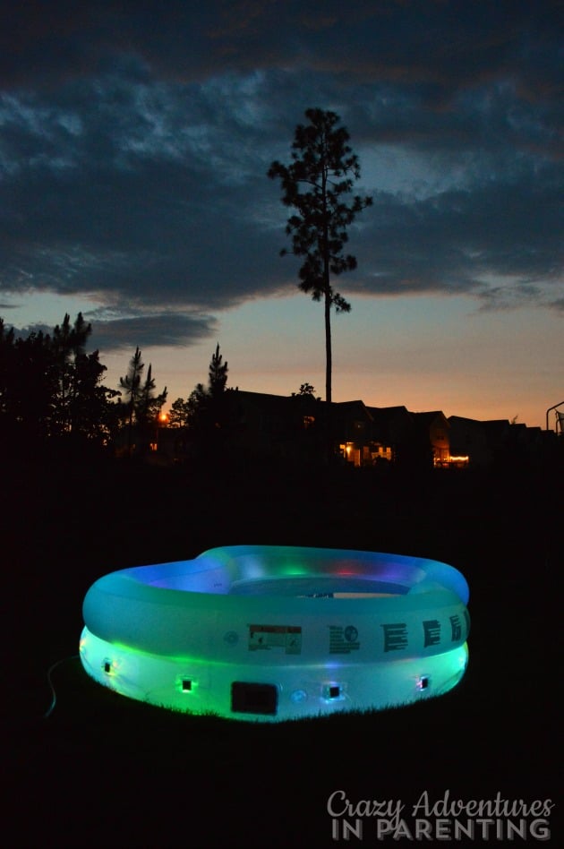 h20go! color wave pool illuminated at night