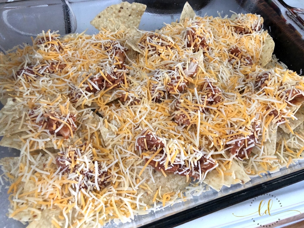 Curly's Barbecue Pulled Chicken Nachos topped with cheese